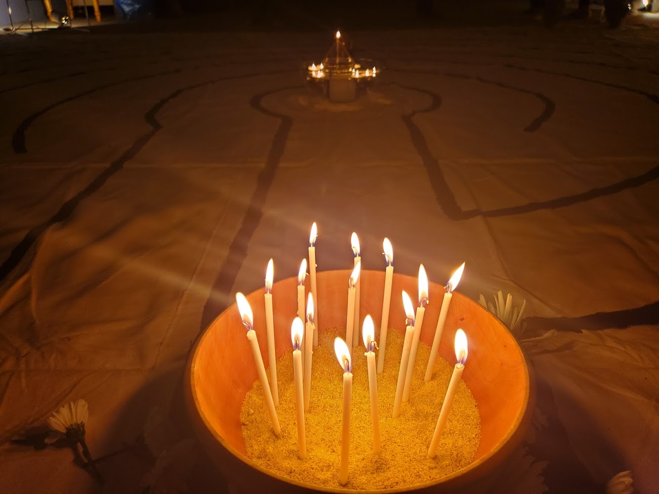 Lit candles in a bowl